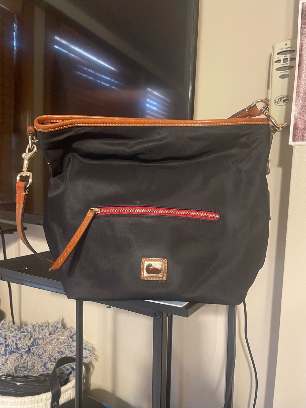 Dooney & Bourke Black Nylon Shoulder Bag with Brown Leather Trim and Red Accent